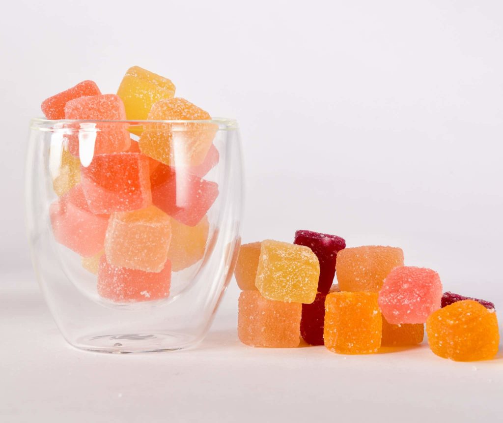 Assorted-flavors-CBD-infused-gummies-300-MG-Dani-Pepper-glass-2